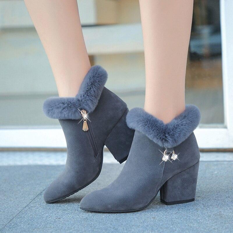 Victoria’s Plush Winter Tassel Ankle Boots
