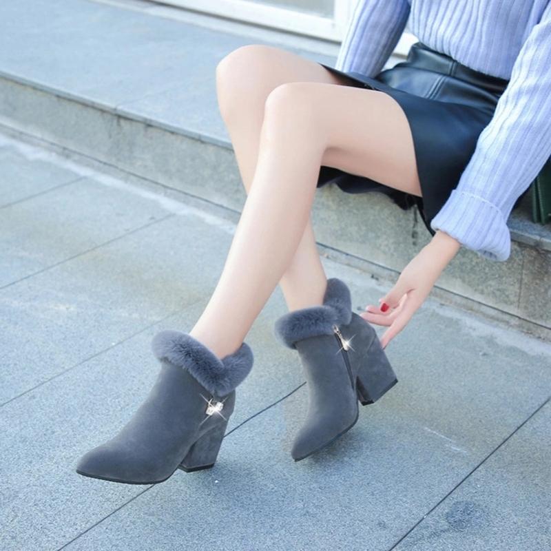 Victoria’s Plush Winter Tassel Ankle Boots