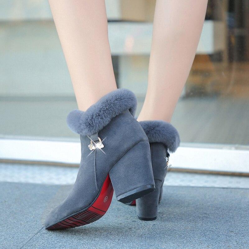 Victoria’s Plush Winter Tassel Ankle Boots