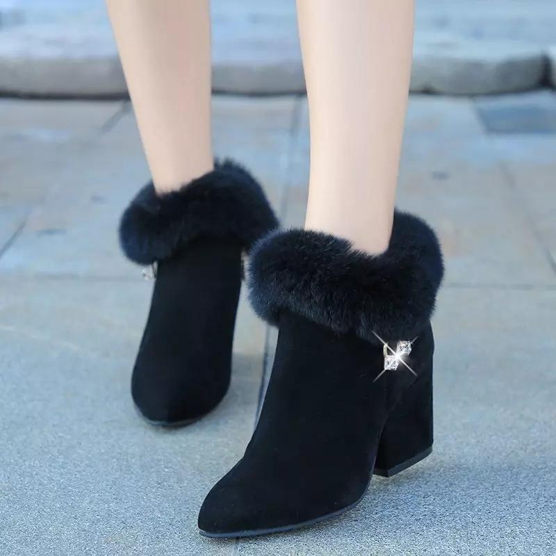 Victoria’s Plush Winter Tassel Ankle Boots