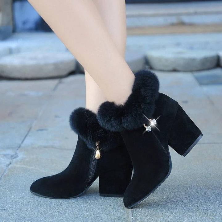 Victoria’s Plush Winter Tassel Ankle Boots