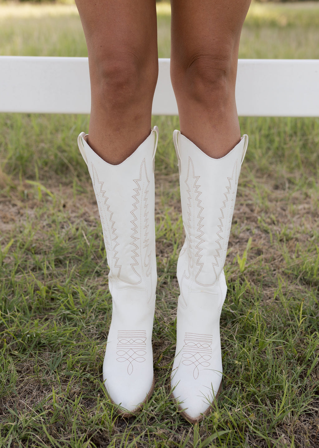 Victoria’s White Embroidered Western Heeled Boots