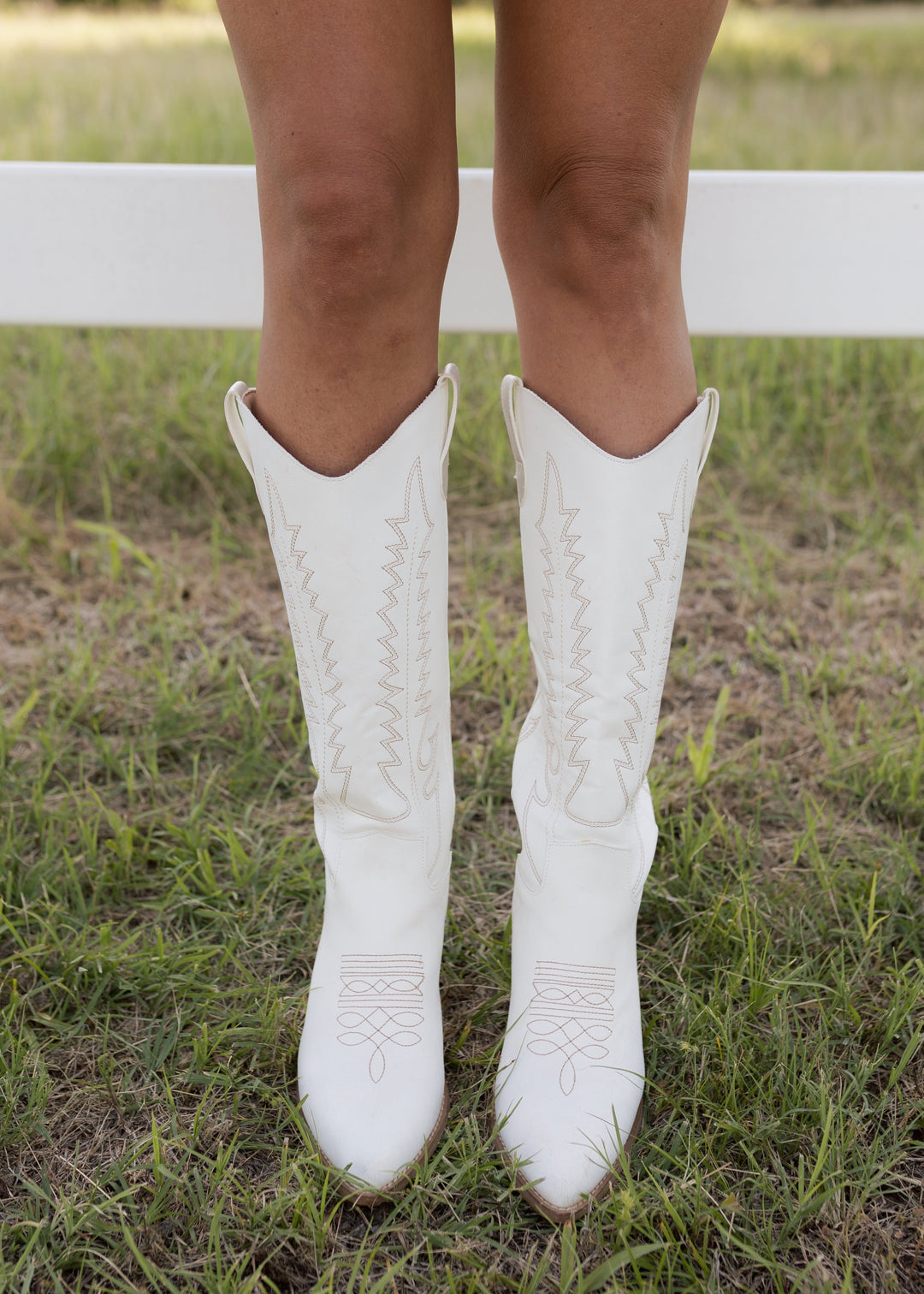 Victoria’s White Embroidered Western Heeled Boots