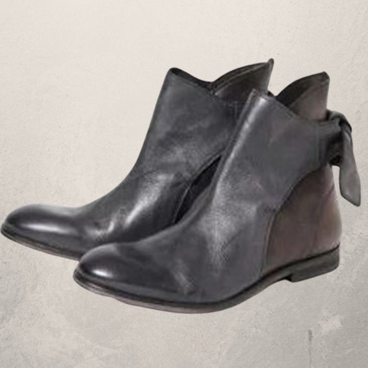 Victoria’s Elegant Bow-Detail Leather Ankle Boots