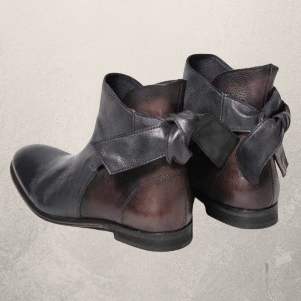 Victoria’s Elegant Bow-Detail Leather Ankle Boots