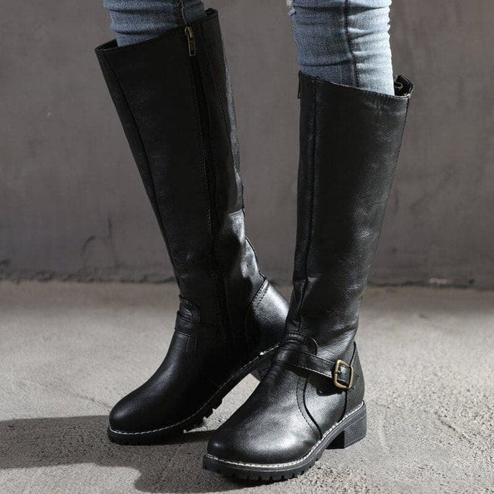 Victoria’s Classic Knee-High Buckle Leather Boots