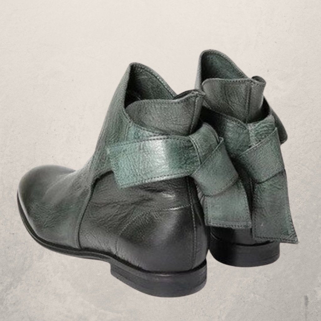 Victoria’s Elegant Bow-Detail Leather Ankle Boots