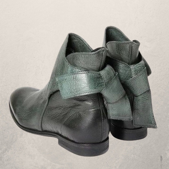 Victoria’s Elegant Bow-Detail Leather Ankle Boots