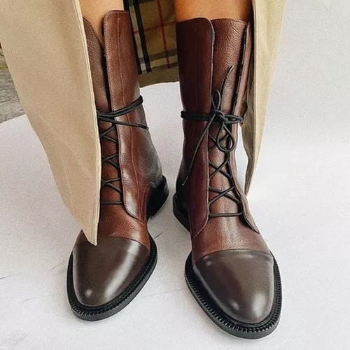 Victoria’s Sleek Leather Lace-Up Boots