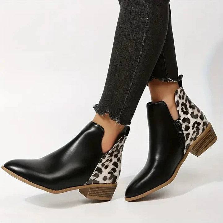 Victoria’s Bold Leopard Heel Ankle Boots